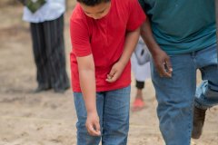 a-young-boy-Learning-how-to-plant-a-garden